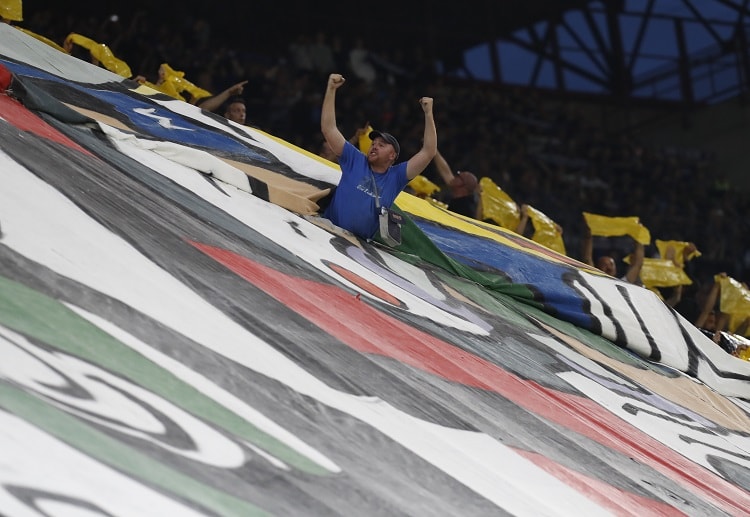 Inter Milan fans celebrate after Lautaro Martinez hits a winning goal against Atletico Madrid in iCC 2018