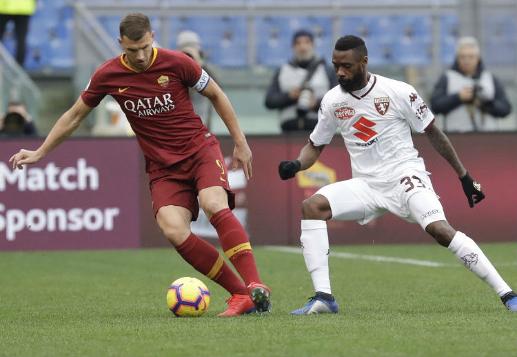 Edin Dzeko are expected to step up for AS Roma when they face Porto in the Champions League round 16