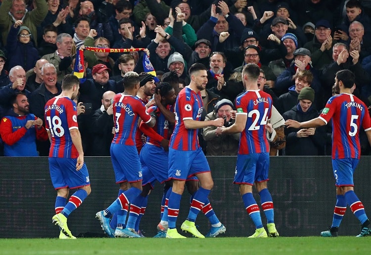 Wilfried Zaha scores Crystal Palace's opening goal against Liverpool in Premier League