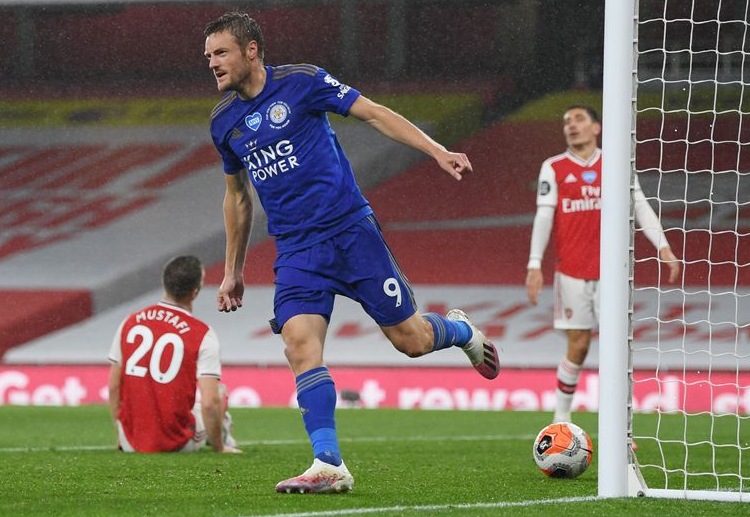 Jamie Vardy scores an equaliser during Leicester City's Premier League match against Arsenal