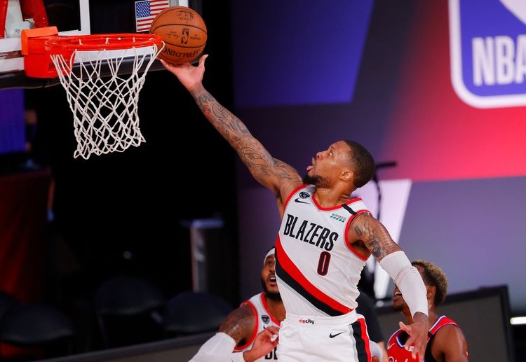 Damian Lillard aims to lead the Trail Blazers against the formidable Lakers in their upcoming NBA playoffs match