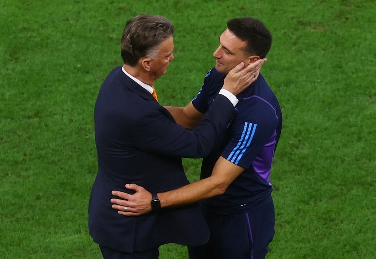 Argentina head coach Lionel Scaloni greets Netherlands manager Louis van Gaal in their World Cup 2022 quarter-final match