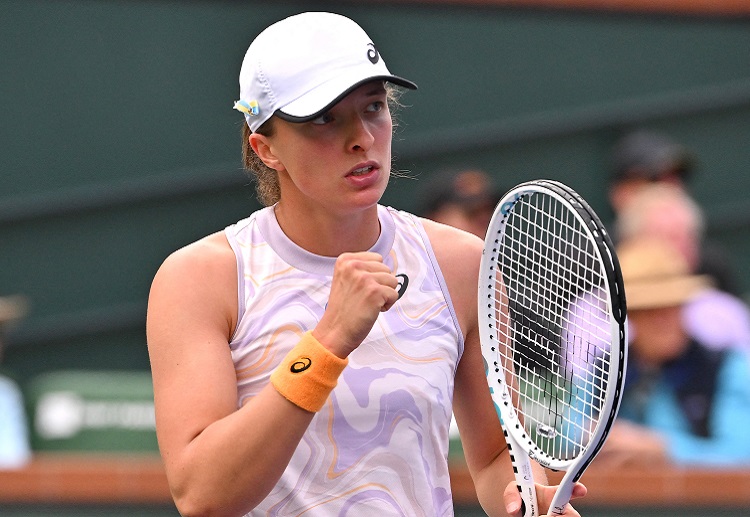 The Indian Wells Masters reigning champion Iga Swiatek won straight sets in her opening match