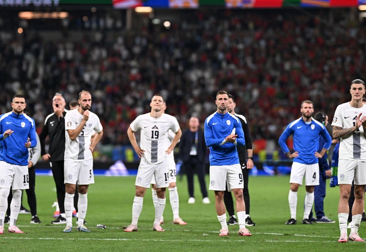 Slovenia look disappointed after losing in the penalty shootout against Portugal in Euro 2024 Round of 16 match