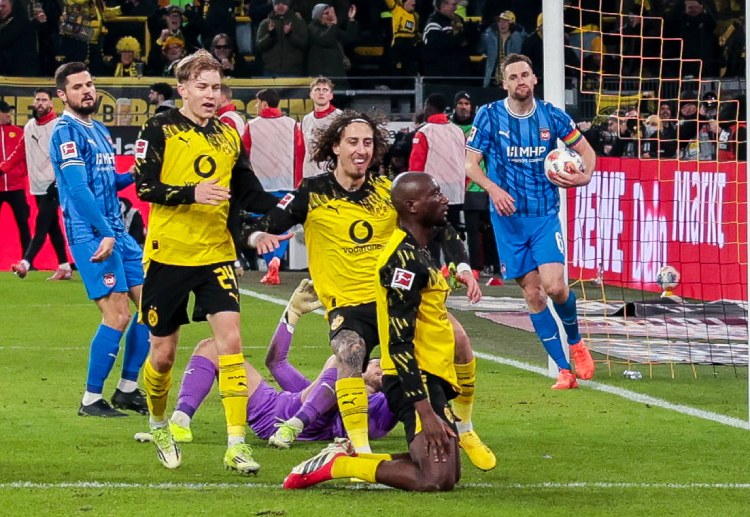 Serhou Guirassy’s brace keeps Borussia Dortmund within six points of Bundesliga leaders Bayern Munich
